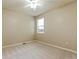 Neutral bedroom with a ceiling fan, carpeted floor, and window with blinds for soft, natural light at 4545 Oxbow Dr, Brighton, CO 80601