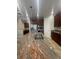 Spacious kitchen island featuring granite countertops and a stainless steel sink at 4545 Oxbow Dr, Brighton, CO 80601