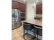 Close-up shot of the kitchen featuring stainless steel appliances and granite countertops at 4545 Oxbow Dr, Brighton, CO 80601