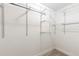 Walk-in closet equipped with wire shelving and carpeted floor at 4545 Oxbow Dr, Brighton, CO 80601