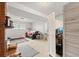 The basement features a fireplace, black sofa, pink accents, and privacy screens at 12603 E Ohio Ave, Aurora, CO 80012