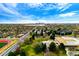 Scenic aerial view overlooking the Denver skyline, lush greenery, and established residential neighborhood at 7080 W 20Th Ave # 202, Lakewood, CO 80214