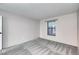 This bright bedroom has new carpeting, neutral walls and a window for natural light at 7080 W 20Th Ave # 202, Lakewood, CO 80214