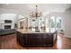 Large kitchen island featuring granite countertops, and lots of cabinet space at 2117 S Juniper St, Lakewood, CO 80228