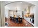 Elegant kitchen with granite countertops, island seating, and custom cabinetry at 2117 S Juniper St, Lakewood, CO 80228