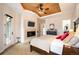 Spacious main bedroom features fireplace, unique ceiling, and patio access, offering comfort and style at 2117 S Juniper St, Lakewood, CO 80228
