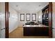 Spacious office with built-in bookshelves, granite countertops, and natural light at 2117 S Juniper St, Lakewood, CO 80228