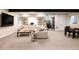 Finished basement features a comfortable seating area, a wine cellar, and a dining space at 619 S High St, Denver, CO 80209