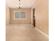Cozy dining room with neutral paint, a window, and natural light streaming through the window at 8588 S Woody Way, Highlands Ranch, CO 80126