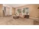 Inviting living room with a fireplace, comfortable seating, and an open layout at 8588 S Woody Way, Highlands Ranch, CO 80126