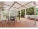 Inviting patio with a metal table and chairs, perfect for enjoying a peaceful outdoor setting at 8588 S Woody Way, Highlands Ranch, CO 80126
