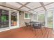 Outdoor patio with table and chairs, offering a perfect space for entertaining and relaxing at 8588 S Woody Way, Highlands Ranch, CO 80126