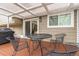 Patio area with an outdoor table and chairs, ideal for enjoying outdoor meals at 8588 S Woody Way, Highlands Ranch, CO 80126