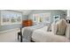 Bright primary bedroom with many windows and a view to the outside at 474 W Spruce St, Louisville, CO 80027