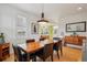 Dining room with hardwood floors, pendant lighting and ample cabinet space at 474 W Spruce St, Louisville, CO 80027