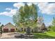 Charming home with mature trees, two car garage and well-manicured lawn at 474 W Spruce St, Louisville, CO 80027