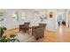 Bright living room featuring white trim, wood floors and staircase at 474 W Spruce St, Louisville, CO 80027
