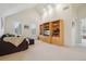 Bright living room with vaulted ceilings, built-in shelving, and comfortable seating at 474 W Spruce St, Louisville, CO 80027