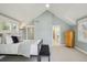 Light and bright main bedroom with vaulted ceilings, ensuite bath, and natural light through shuttered windows at 474 W Spruce St, Louisville, CO 80027