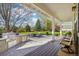 Back patio with outdoor kitchen, lounge area, and scenic backyard at 474 W Spruce St, Louisville, CO 80027