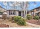 Charming single-story home with manicured landscaping and a welcoming front porch, enhancing curb appeal at 1380 S Fillmore St, Denver, CO 80210