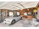 Spacious garage featuring car, storage solutions, and workspace, offering practical utility and organization at 1380 S Fillmore St, Denver, CO 80210