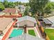 Aerial shot highlighting a home's backyard, showcasing the turf, privacy fencing and the overall lot layout at 3470 W Walsh Pl, Denver, CO 80219