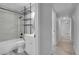 This full bathroom features a shower over tub and nice decor at 3470 W Walsh Pl, Denver, CO 80219