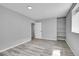 This bedroom provides wood floors and built-in shelves at 3470 W Walsh Pl, Denver, CO 80219