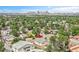Panoramic aerial capture showcasing a neighborhood with stunning views of the distant Denver skyline at 3470 W Walsh Pl, Denver, CO 80219