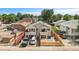 Well-maintained home with an inviting exterior, off-street parking, and a neatly fenced yard at 3470 W Walsh Pl, Denver, CO 80219