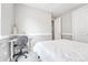Bright bedroom with desk and chair, perfect for a home office space at 10887 Endeavor Dr, Parker, CO 80134