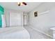 Bedroom with a sliding closet and a simple decoration at 10887 Endeavor Dr, Parker, CO 80134