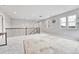 Open hallway with staircase and lots of natural light at 10887 Endeavor Dr, Parker, CO 80134