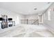Long hallway with dark railing and plush carpet at 10887 Endeavor Dr, Parker, CO 80134