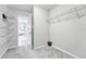 Walk-in closet featuring wire rack shelving and access to the bedroom at 10887 Endeavor Dr, Parker, CO 80134