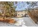 Exterior backyard view of house with patio, balcony, and shed at 364 Willowick Cir, Highlands Ranch, CO 80129