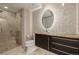 Bathroom featuring granite vanity, modern fixtures, tile surround shower, and tiled floor at 364 Willowick Cir, Highlands Ranch, CO 80129