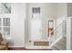 Bright foyer with high ceilings and a view of the staircase, accented with decorative rug at 364 Willowick Cir, Highlands Ranch, CO 80129