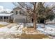 Charming two-story gray home featuring an attached two-car garage and a well-maintained front yard at 364 Willowick Cir, Highlands Ranch, CO 80129