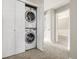 Convenient laundry closet with stacked washer and dryer units for efficient space utilization at 364 Willowick Cir, Highlands Ranch, CO 80129