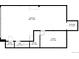 Unfinished basement with garage, storage, and multiple rooms at 9711 W Indore Dr, Littleton, CO 80128