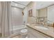 Clean bathroom with shower/tub combo and granite vanity at 2 Garfield St # B, Denver, CO 80206