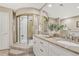 Bathroom features a large, round shower with multiple shower heads and double vanity at 2 Garfield St # B, Denver, CO 80206