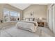 Bright bedroom with vaulted ceilings, large windows, and ample floor space at 2 Garfield St # B, Denver, CO 80206