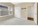Bright bedroom featuring carpet, large closet, and window at 2 Garfield St # B, Denver, CO 80206