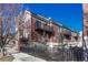 Brick townhouse with private balconies at 2 Garfield St # B, Denver, CO 80206