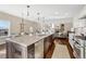 Bright kitchen boasts granite countertops, stainless steel appliances, and ample cabinet space at 2 Garfield St # B, Denver, CO 80206