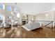 Open concept living area with hardwood floors and a view to the kitchen at 2 Garfield St # B, Denver, CO 80206