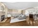 Living room features hardwood floors, fireplace, and an open floorplan at 2 Garfield St # B, Denver, CO 80206